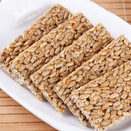 瓜子酥瓜子仁葵花籽仁餅?zāi)芰考芴禺a(chǎn)零食獨(dú)立包裝批發(fā)100g 3斤圖片大全 郵樂(lè)官方網(wǎng)站